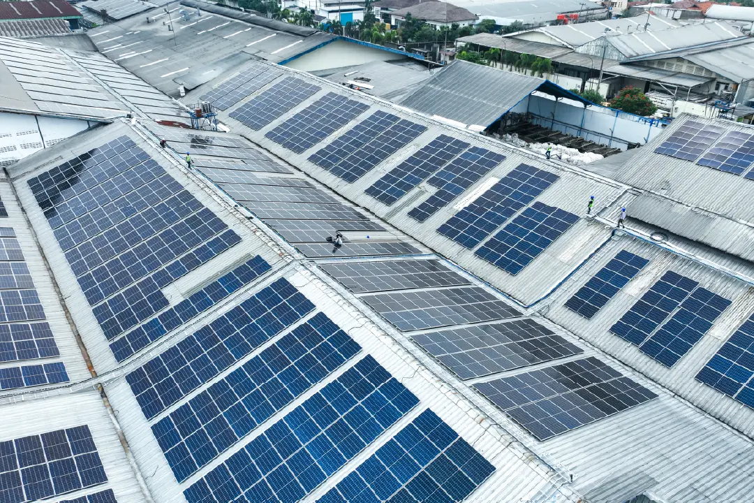 Aerial photo of solar panels on the PT. Cave Sumber Berkat factory roofs